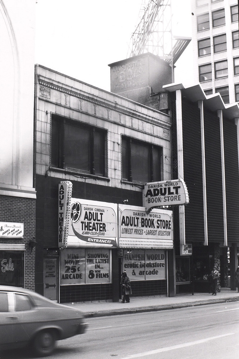 View of the building that once stood at 107 E. 12th Street. At the time, the building housed the Danish Cinema adult theatre.